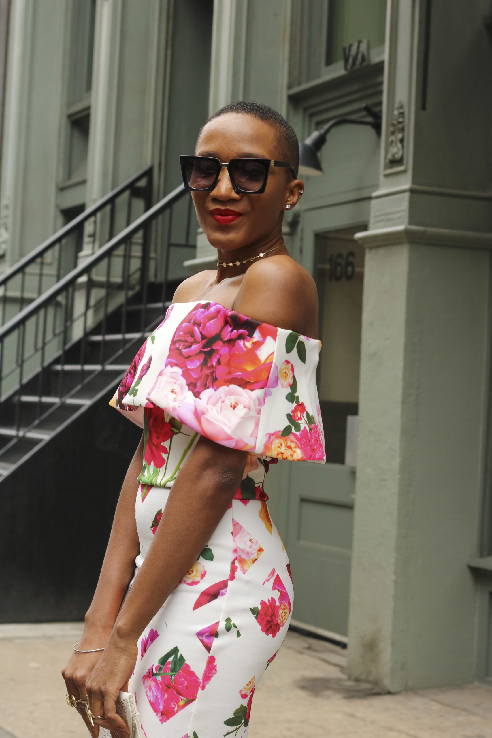 Ms Rexti in a Floral Bardot Dress