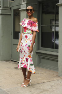 Ms Rexti in a Floral Bardot Dress