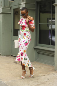 Ms Rexti in a Floral Bardot Dress