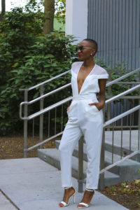 Ms Rexti in a White Jumpsuit