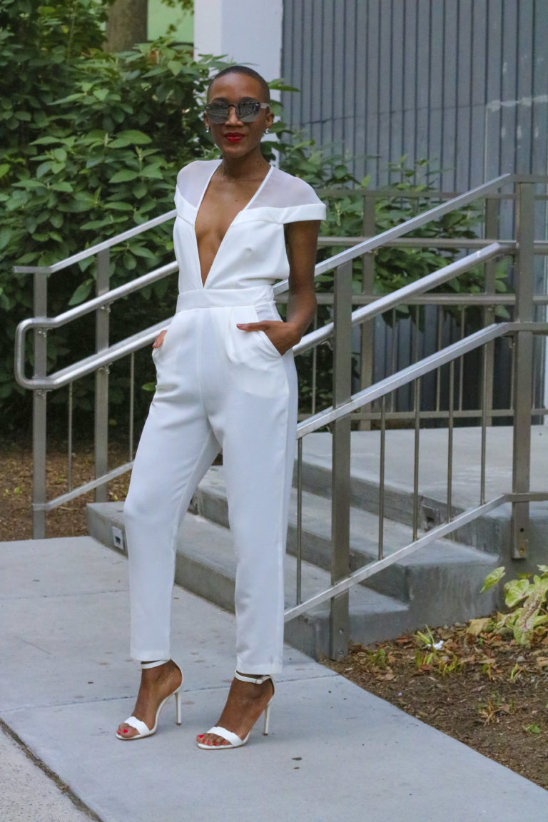 Ms Rexti in a White Jumpsuit