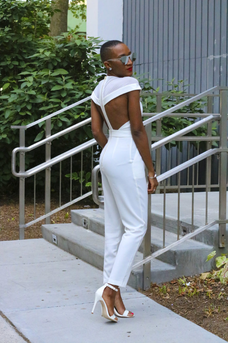 Ms Rexti in a White Jumpsuit